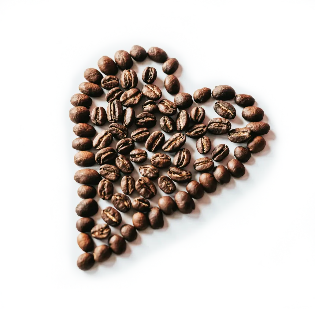 Coffee beans arranged in a heart shape